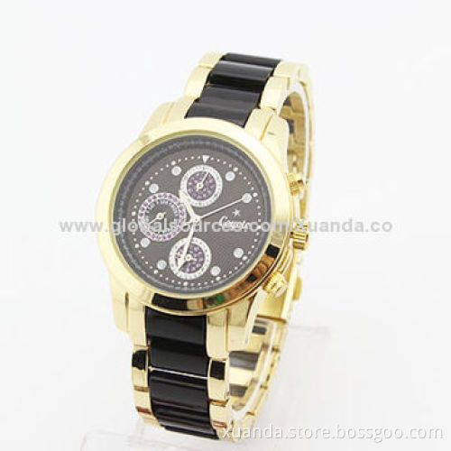 Football star wristwatch with power function, resin and metal match strap, metal case